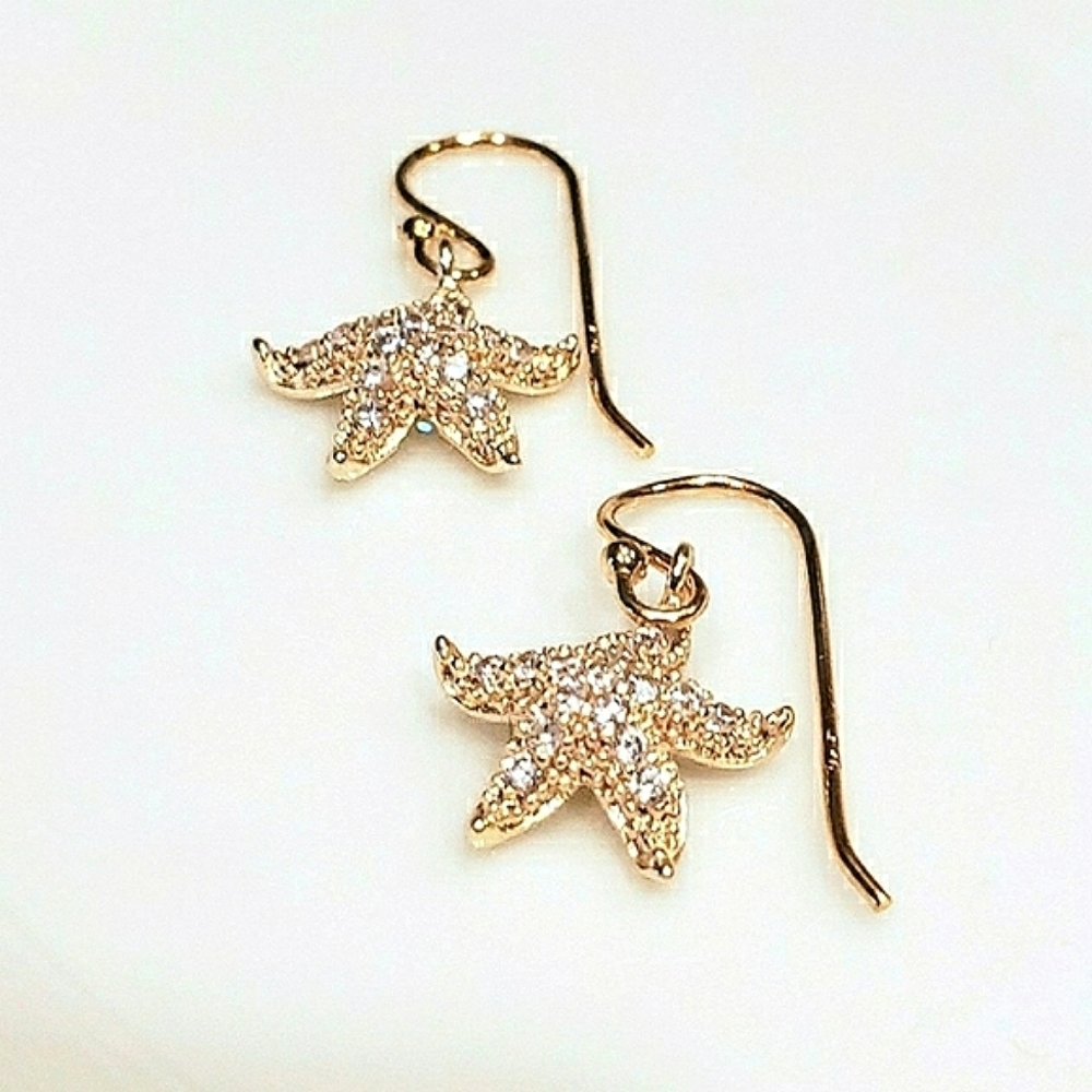 .925 sterling silver earrings: micropave starfish on 24k gp sterling hooks; nwot